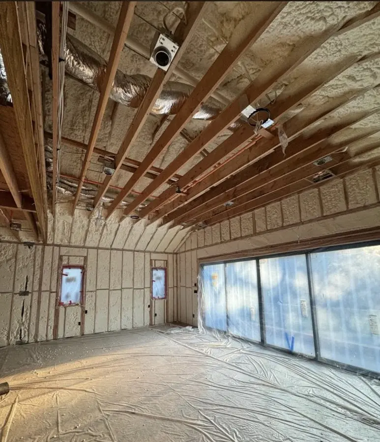 Interior walls and ceiling insulated with spray foam during new construction in Socorro